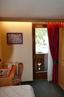 Hotel Garnì La Montanaraにあるベッド