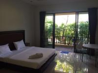 Ein Bett oder Betten in einem Zimmer der Unterkunft B Happy Resort - SHA ExtraPlus