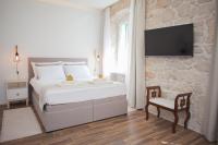Posteľ alebo postele v izbe v ubytovaní Apartment Barone