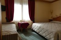 Hotel Garnì La Montanaraにあるベッド