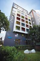 a large building with balconies on the side of it at Micasa Hotel in Taichung