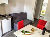 Kuchyň nebo kuchyňský kout v ubytování Apartments J&K