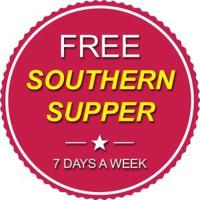 Un cartel que dice &quot;Cena sureña gratis días a la semana&quot; en Super 8 by Wyndham Lake City, en Lake City