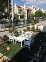 A garden outside Ede Apart Otel