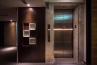 an elevator in a building with its door open at HOTEL HI- Chui-Yang in Chiayi City