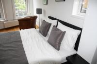 Ein Bett oder Betten in einem Zimmer der Unterkunft Bridge Inn