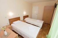 Postel nebo postele na pokoji v ubytování Lazaretto Palace