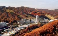 an aerial view of a city with a mountain at Phoenix Resort Pyeongchang in Pyeongchang 