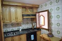 Kuchyň nebo kuchyňský kout v ubytování Chuca House
