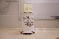 a can on a counter in a kitchen at C&C Residence Hotel in Bacău
