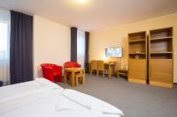 Postel nebo postele na pokoji v ubytování Hotel Trend