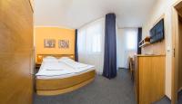 Postel nebo postele na pokoji v ubytování Hotel Trend
