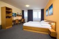 Postel nebo postele na pokoji v ubytování Hotel Trend