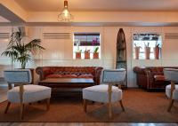 a living room with a couch and two chairs at Delamar 4*Sup-Adults only (18+) in Lloret de Mar
