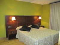 Postel nebo postele na pokoji v ubytování Hotel De Rei