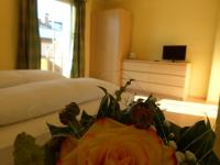 Postel nebo postele na pokoji v ubytování Hotel Fischachstubn