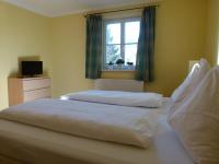 Postel nebo postele na pokoji v ubytování Hotel Fischachstubn