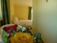 Postel nebo postele na pokoji v ubytování Hotel Fischachstubn