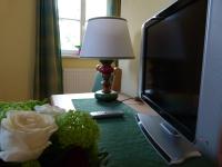 TV a/nebo společenská místnost v ubytování Hotel Fischachstubn