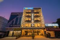 a building with a sign on the front of it at FabHotel The Oasis - Maharana Praatap Nagar in Bhopal