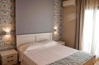Posteľ alebo postele v izbe v ubytovaní Hyacinthus-Cressida Seaside Apartments