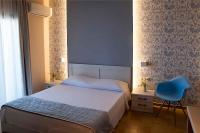 Posteľ alebo postele v izbe v ubytovaní Hyacinthus-Cressida Seaside Apartments