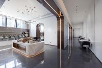 a living room with a table and a dining room at Shenzhen Guanlan Sanyi Yundu Yaduo X Hotel in Shenzhen