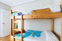 Posteľ alebo postele v izbe v ubytovaní Acà Y Allà Apartamento Alfonso El Batallador
