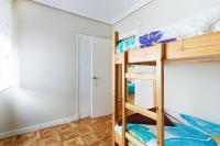 Posteľ alebo postele v izbe v ubytovaní Acà Y Allà Apartamento Alfonso El Batallador