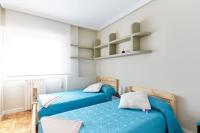 Posteľ alebo postele v izbe v ubytovaní Acà Y Allà Apartamento Alfonso El Batallador
