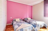 Posteľ alebo postele v izbe v ubytovaní Acà Y Allà Apartamento Alfonso El Batallador