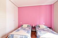 Posteľ alebo postele v izbe v ubytovaní Acà Y Allà Apartamento Alfonso El Batallador