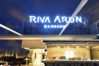 a restaurant with a sign that reads ryan aron dancing at Riva Arun Bangkok in Bangkok