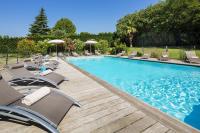 a pool with chaise lounge chairs and a swimming pool at Best Western PLUS Elixir Grasse in Grasse
