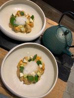 twee borden eten bovenop een tafel bij La Noccemada, maison d'hôtes in Saint-Julien