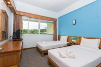 Postel nebo postele na pokoji v ubytování Riverside Hotel