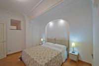A bed or beds in a room at Villa Gaetano Praiano