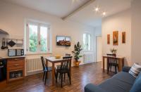 Televízia a/alebo spoločenská miestnosť v ubytovaní La Coroncina Lodging