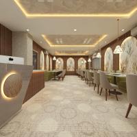 un restaurante con mesas y sillas en Hotel Vista Haven, en Patna