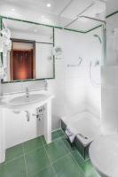 Łazienka w obiekcie Hotel Lunik