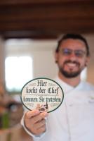 Certifikát, hodnocení, plakát nebo jiný dokument vystavený v ubytování Gasthof am Schloss