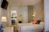 Posteľ alebo postele v izbe v ubytovaní Hotel Malaga Picasso