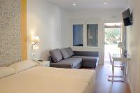 Posteľ alebo postele v izbe v ubytovaní Hotel Malaga Picasso