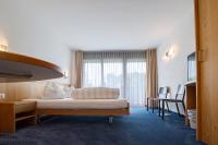 Hotel Rössli Tufertschwilにあるベッド