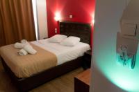 Posteľ alebo postele v izbe v ubytovaní Athens Choice Hotel