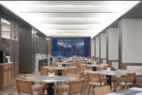 En restaurant eller et andet spisested på Lijiang Gucheng District RIM Hotel