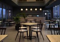 een restaurant met tafels en stoelen in een kamer bij MNM Luxury Suit 424 in Pretoria