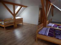 Postel nebo postele na pokoji v ubytování Apartment U Lochů