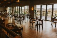 En restaurant eller et andet spisested på Tailor Room 2