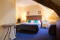 Una cama o camas en una habitaci&oacute;n de Le Clos d&#39;Amboise